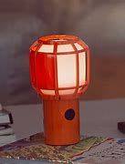 Lampe de table à piles LED Orange Spark
